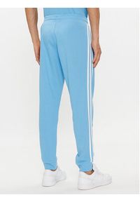 Adidas - adidas Spodnie dresowe adicolor 3-Stripes IM9451 Niebieski Slim Fit. Kolor: niebieski. Materiał: bawełna #4