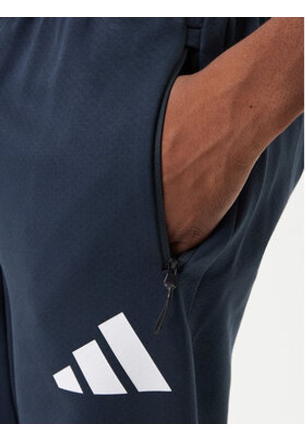 Adidas - adidas Spodnie dresowe Z.N.E. JW4723 Granatowy Loose Fit. Kolor: niebieski. Materiał: syntetyk, bawełna