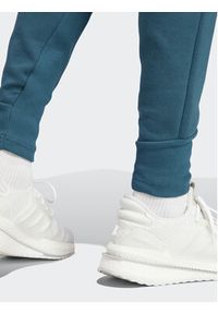 Adidas - adidas Spodnie dresowe IN5100 Turkusowy Regular Fit. Kolor: turkusowy. Materiał: bawełna #7