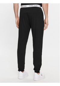 Tommy Jeans Spodnie dresowe UM0UM02962 Czarny Regular Fit. Kolor: czarny. Materiał: syntetyk, bawełna