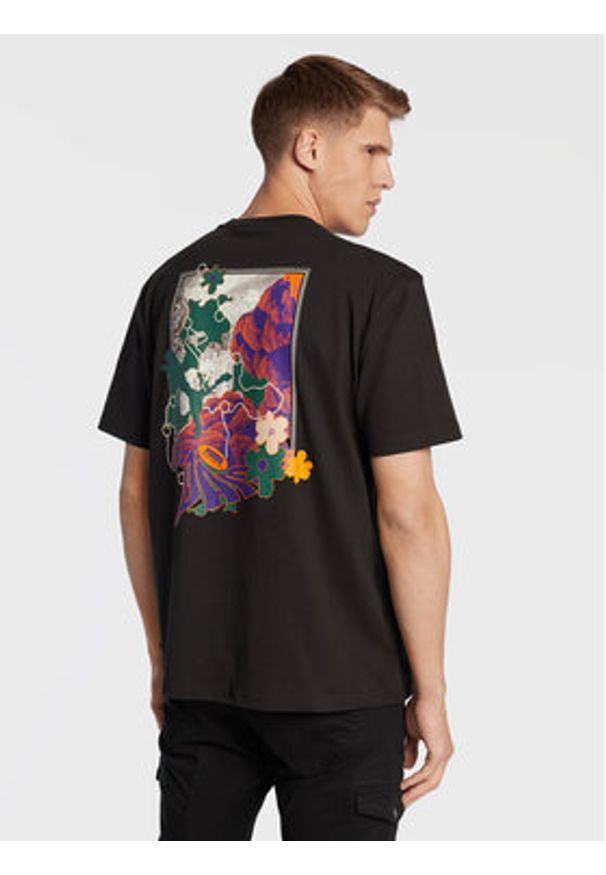 Puma T-Shirt P.A.M. Graphic 536003 Czarny Relaxed Fit. Kolor: czarny. Materiał: bawełna
