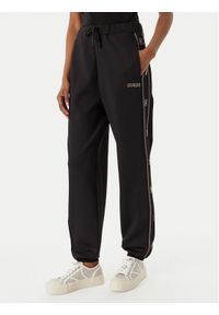 Guess Spodnie dresowe V5BB23 KCX22 Czarny Wide Leg. Kolor: czarny. Materiał: syntetyk #1