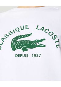 Lacoste - LACOSTE - Biała bluza z logo. Kolor: biały. Materiał: bawełna, polar. Długość rękawa: raglanowy rękaw. Wzór: kolorowy. Styl: klasyczny, vintage, elegancki #4