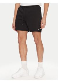 Tommy Jeans Szorty sportowe Flag Beach DM0DM21931 Czarny Regular Fit. Kolor: czarny. Materiał: bawełna. Styl: sportowy
