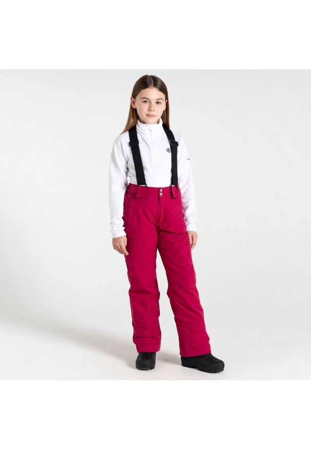 DARE 2B - Motive Kids Spodnie narciarskie. Kolor: różowy. Materiał: poliester. Sezon: zima. Sport: narciarstwo