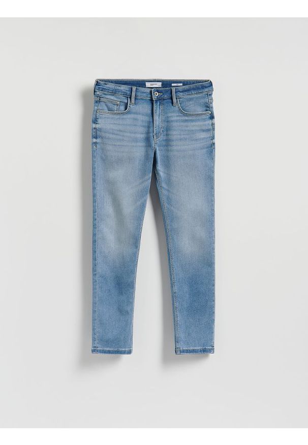 Reserved - Jeansy slim z efektem sprania - niebieski. Kolor: niebieski
