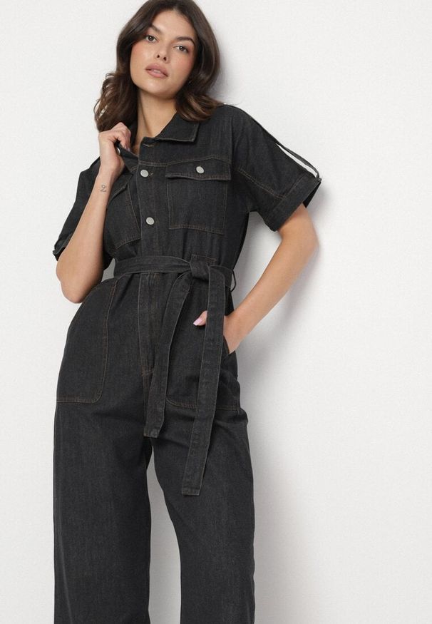 Born2be - Czarny Jeansowy Kombinezon z Wiązaniem w Talii i Szerokimi Nogawkami Xenadea. Kolor: czarny. Materiał: jeans. Styl: klasyczny, elegancki