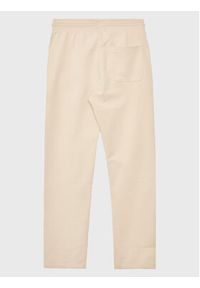 Calvin Klein Jeans Spodnie dresowe Monogram IG0IG01985 Beżowy Regular Fit. Kolor: beżowy. Materiał: bawełna