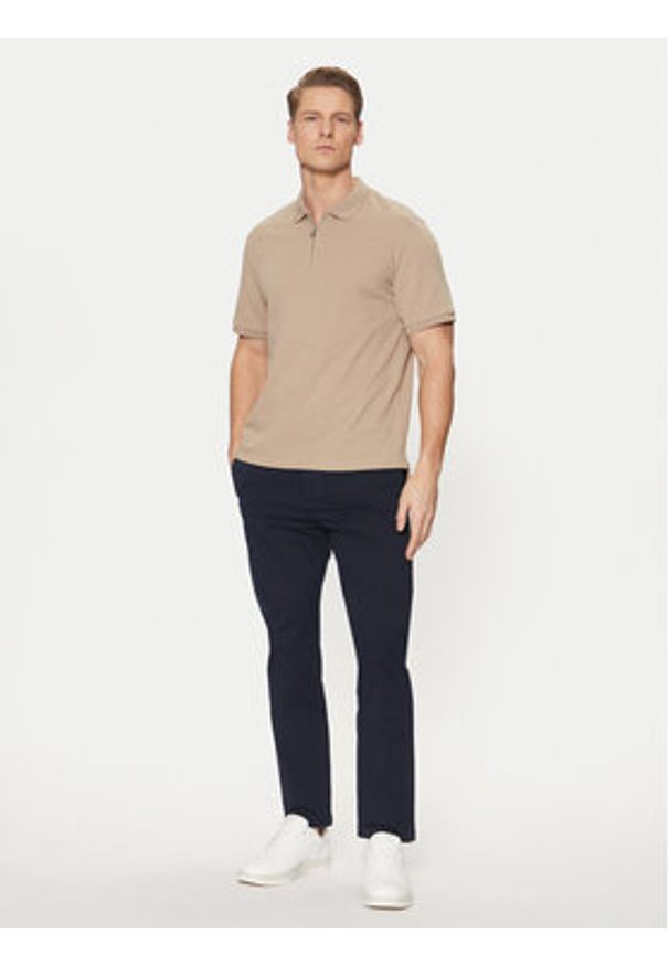 Hugo - HUGO Chinosy 50530886 Granatowy Slim Fit. Kolor: niebieski. Materiał: bawełna