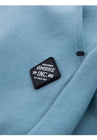Ombre Clothing - Spodnie dresowe męskie ze ściągaczami i ozdobnym zamkiem – jasnoniebieskie V4. Kolor: niebieski. Materiał: dresówka. Styl: sportowy, elegancki #4