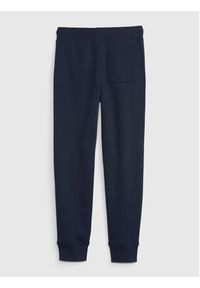 GAP - Gap Spodnie dresowe 735709-00 Granatowy Regular Fit. Kolor: niebieski. Materiał: bawełna