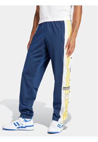 Adidas - adidas Spodnie dresowe adicolor Classics Adibreak IM8223 Granatowy Regular Fit. Kolor: niebieski. Materiał: syntetyk