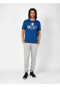 Champion T-shirt | 217997 | Mężczyzna | Niebieski. Okazja: na co dzień. Kolor: niebieski. Materiał: bawełna. Wzór: nadruk. Styl: casual, elegancki