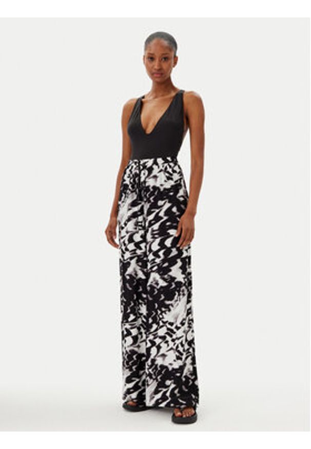 Calvin Klein Swimwear Spodnie palazzo KW0KW02823 Czarny Relaxed Fit. Kolor: czarny. Materiał: wiskoza