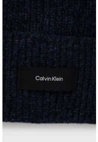 Calvin Klein czapka wełniana kolor granatowy z cienkiej dzianiny wełniana. Kolor: niebieski. Materiał: wełna, dzianina #2