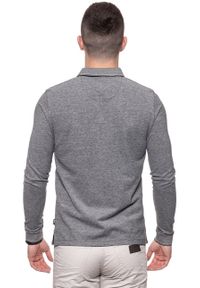 Wrangler - WRANGLER POLO LS POLO REAL BLACK W7A87K5W5 112131306. Typ kołnierza: polo. Długość rękawa: długi rękaw. Długość: długie. Wzór: melanż #10