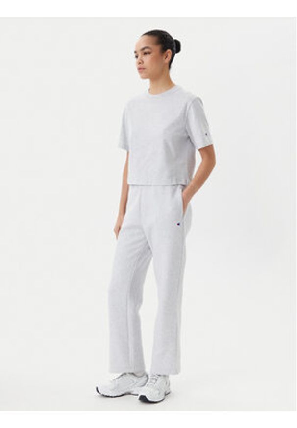 Champion Spodnie dresowe 117983 Szary Slim Fit. Kolor: szary. Materiał: bawełna