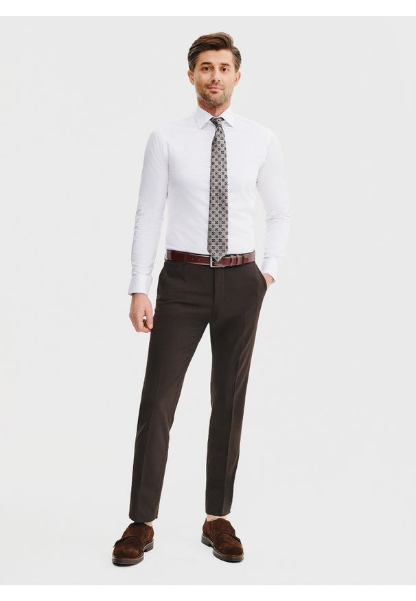 Pako Lorente - PAKO LORENTE – Brązowe spodnie garniturowe. Kolor: brązowy. Materiał: wełna, poliester. Wzór: gładki. Styl: elegancki
