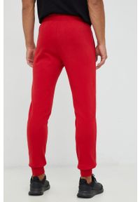 4f - 4F spodnie dresowe męskie kolor czerwony gładkie. Kolor: czerwony. Materiał: dresówka. Wzór: gładki #4