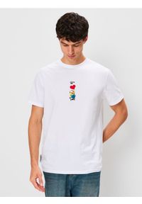 Sinsay - Bawełniana koszulka z nadrukiem Minions - biały. Kolor: biały. Materiał: bawełna. Wzór: nadruk #1