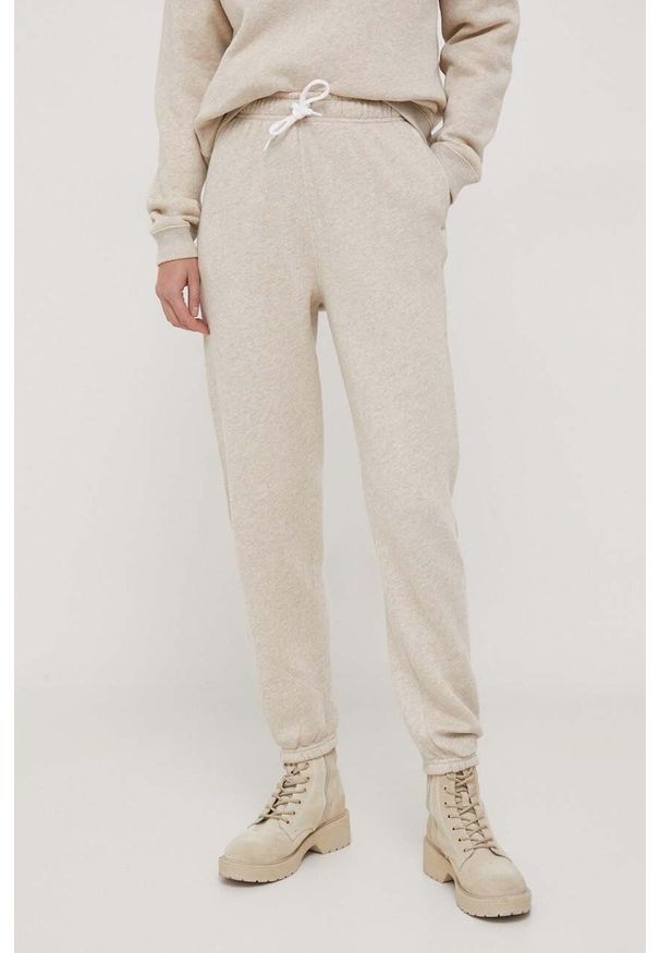 Polo Ralph Lauren spodnie dresowe kolor beżowy gładkie. Stan: podwyższony. Kolor: beżowy. Materiał: dresówka. Wzór: gładki