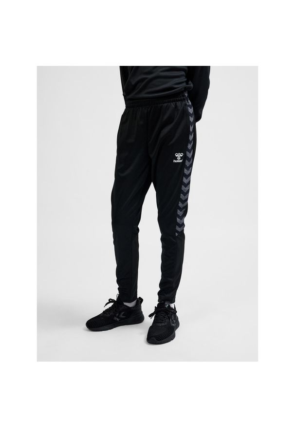 Hummel spodnie dziecięce sportowe dresowe Authentic Training Pants. Kolor: czarny. Materiał: dresówka. Sport: joga i pilates
