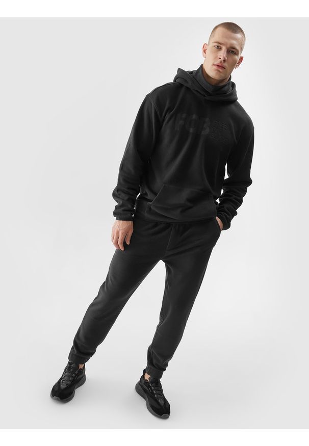 4f - Spodnie polarowe joggery męskie - czarne. Kolor: czarny. Materiał: polar