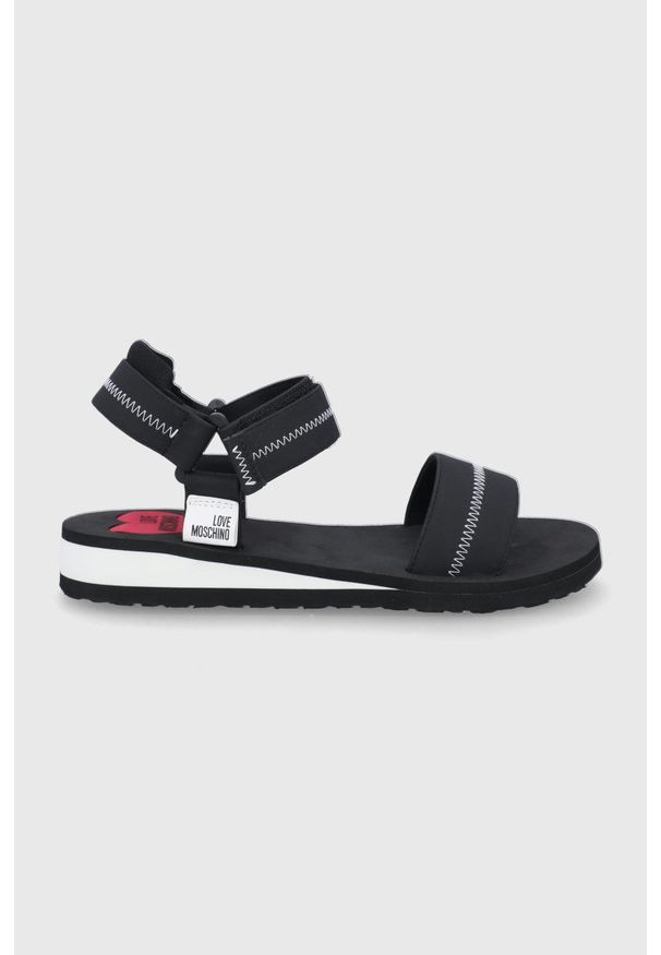 Love Moschino sandały damskie kolor czarny. Zapięcie: rzepy. Kolor: czarny. Obcas: na obcasie. Wysokość obcasa: niski