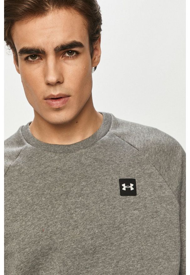 Under Armour bluza 1357096 męska kolor szary gładka. Okazja: na co dzień. Kolor: szary. Materiał: dzianina. Długość rękawa: raglanowy rękaw. Wzór: gładki. Styl: casual
