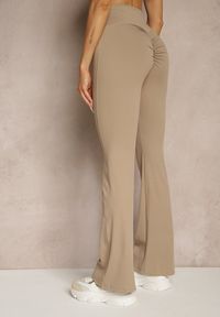 Renee - Beżowe Legginsy Dzwony High Waist Orruvana. Stan: podwyższony. Kolor: beżowy. Materiał: tkanina #3