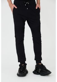 Balmain - BALMAIN Czarne spodnie dresowe RIbbed Flock Sweatpants. Kolor: czarny. Materiał: dresówka