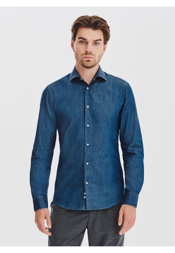 Pako Lorente - PAKO LORENTE - Niebieska koszula jeansowa. Typ kołnierza: kołnierzyk włoski. Kolor: niebieski. Materiał: jeans. Długość rękawa: długi rękaw. Długość: długie. Wzór: gładki