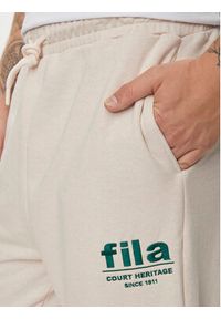 Fila Spodnie dresowe FAM0647 Beżowy Regular Fit. Kolor: beżowy. Materiał: bawełna #5