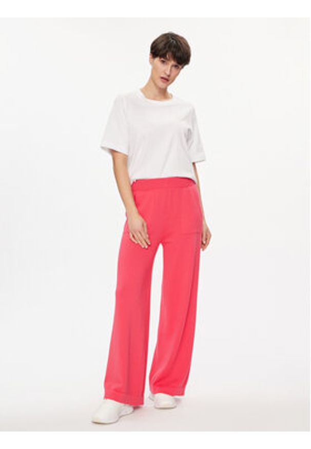 United Colors of Benetton - United Colors Of Benetton Spodnie dresowe 1294DF009 Różowy Relaxed Fit. Kolor: różowy. Materiał: bawełna