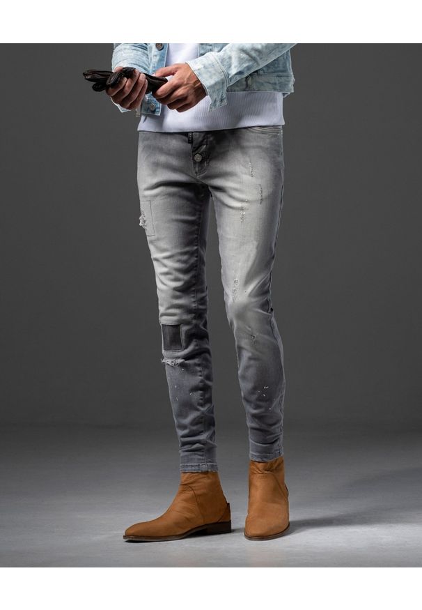 GUNS & TUXEDOS - Szare jeansy z przetarciami Wolf. Kolor: szary. Styl: elegancki