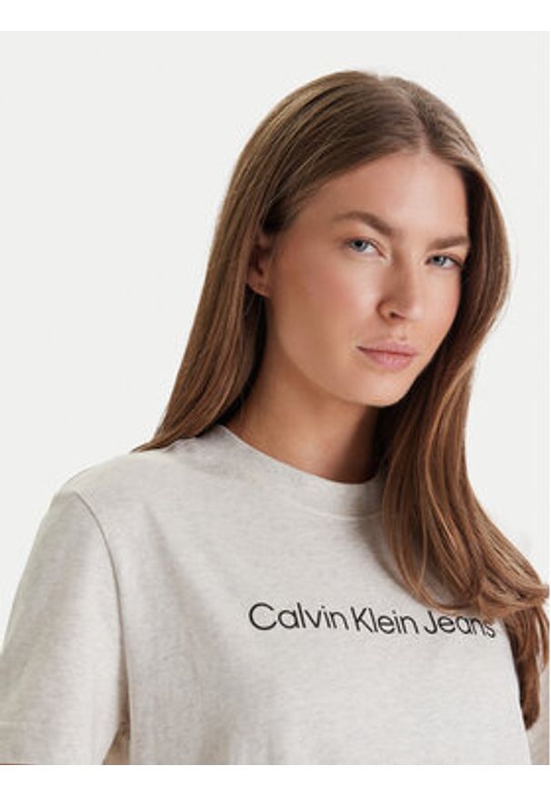 Calvin Klein Jeans T-Shirt LV047C912G Beżowy Regular Fit. Kolor: beżowy. Materiał: bawełna
