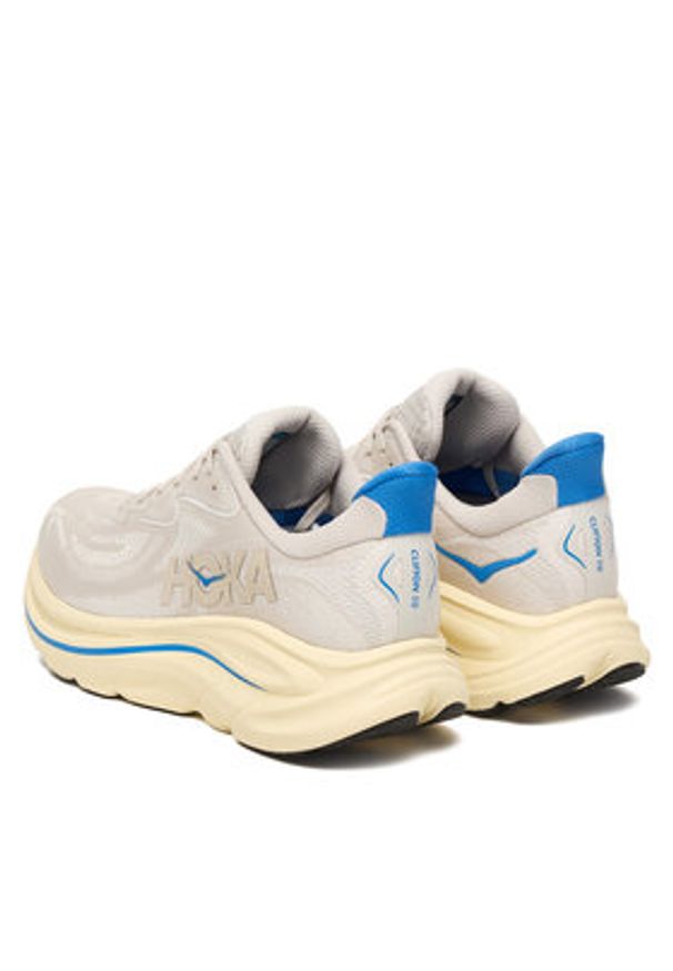 HOKA - Hoka Buty do biegania Clifton 10 1162030 Écru. Kolor: kremowy. Materiał: materiał