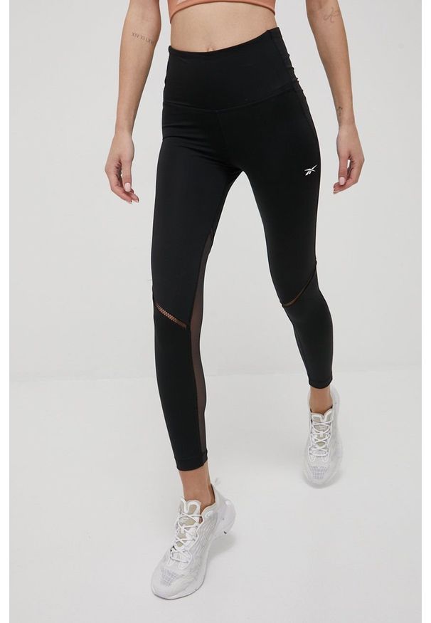 Reebok legginsy treningowe Les Mills® Lux Perform damskie kolor czarny gładkie. Stan: podwyższony. Kolor: czarny. Materiał: materiał, dzianina, skóra. Wzór: gładki. Sport: fitness