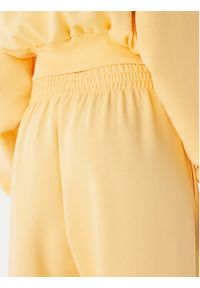 Adidas - adidas Spodnie dresowe Soft Lux KA7020 Pomarańczowy Loose Fit. Kolor: pomarańczowy. Materiał: syntetyk #2