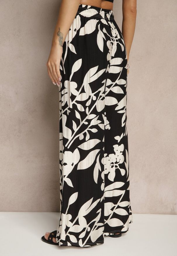 Renee - Czarne Szerokie Spodnie z Wiskozy High Waist w Kwiatowy Wzór Elaneora. Okazja: na co dzień. Stan: podwyższony. Kolor: czarny. Materiał: wiskoza. Wzór: kwiaty. Styl: elegancki, casual