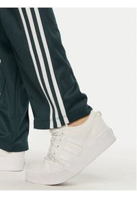Adidas - adidas Spodnie dresowe Beckenbauer IY2226 Zielony Regular Fit. Kolor: zielony. Materiał: bawełna #3