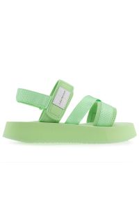 Sandały Calvin Klein Prefresato Sandal Badge YW0YW00967-0H9 - zielone. Zapięcie: rzepy. Kolor: zielony. Materiał: materiał. Szerokość cholewki: normalna. Wzór: paski. Sezon: lato. Obcas: na platformie #1