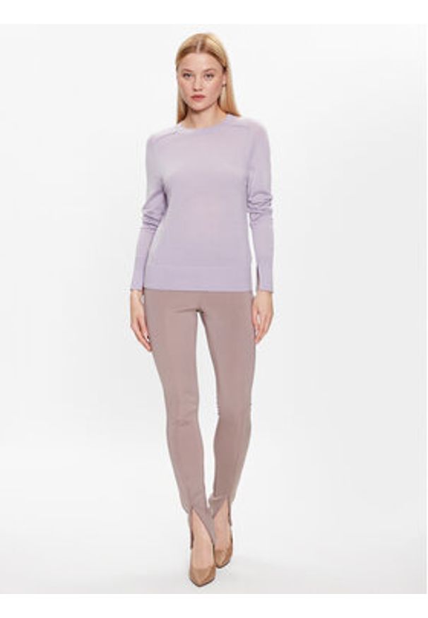 Calvin Klein Sweter K20K205777 Fioletowy Regular Fit. Kolor: fioletowy. Materiał: wełna