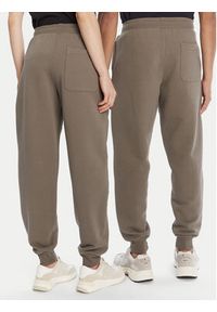 AMI PARIS - AMI Paris Spodnie dresowe UTR240.747 Khaki Regular Fit. Kolor: brązowy. Materiał: bawełna #4