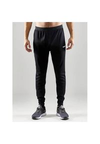 Spodnie treningowe męskie Craft Evolve Slim. Kolor: czarny. Materiał: dresówka. Sport: fitness