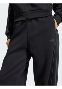 Adidas - adidas Spodnie dresowe 164782 Czarny Loose Fit. Kolor: czarny. Materiał: dresówka #2