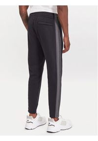 Under Armour Spodnie dresowe Ua Rival Fleece Colorblock 6003954 Czarny Loose Fit. Kolor: czarny. Materiał: bawełna #4