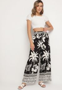 Born2be - Czarne Spodnie z Tropikalnym Wzorem i Szerokimi Nogawkami Emivelli. Okazja: na co dzień. Kolor: czarny. Styl: elegancki, casual #5