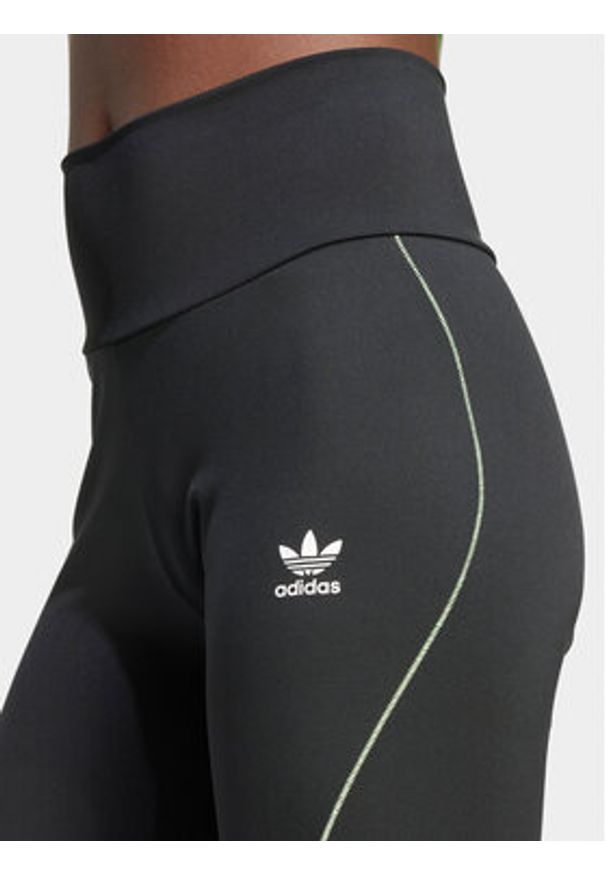 Adidas - adidas Legginsy Graphic IT9700 Czarny Slim Fit. Kolor: czarny. Materiał: syntetyk