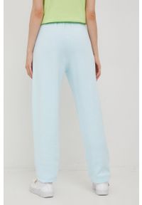 adidas Originals spodnie dresowe damskie gładkie. Kolor: niebieski. Materiał: dresówka. Wzór: gładki #2